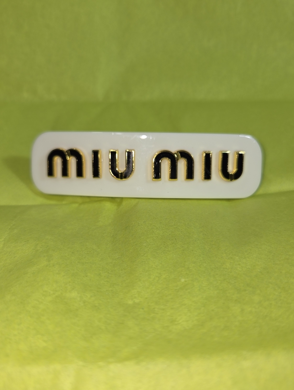 Miu Miu White Hair Clip with Black and Gold Logo